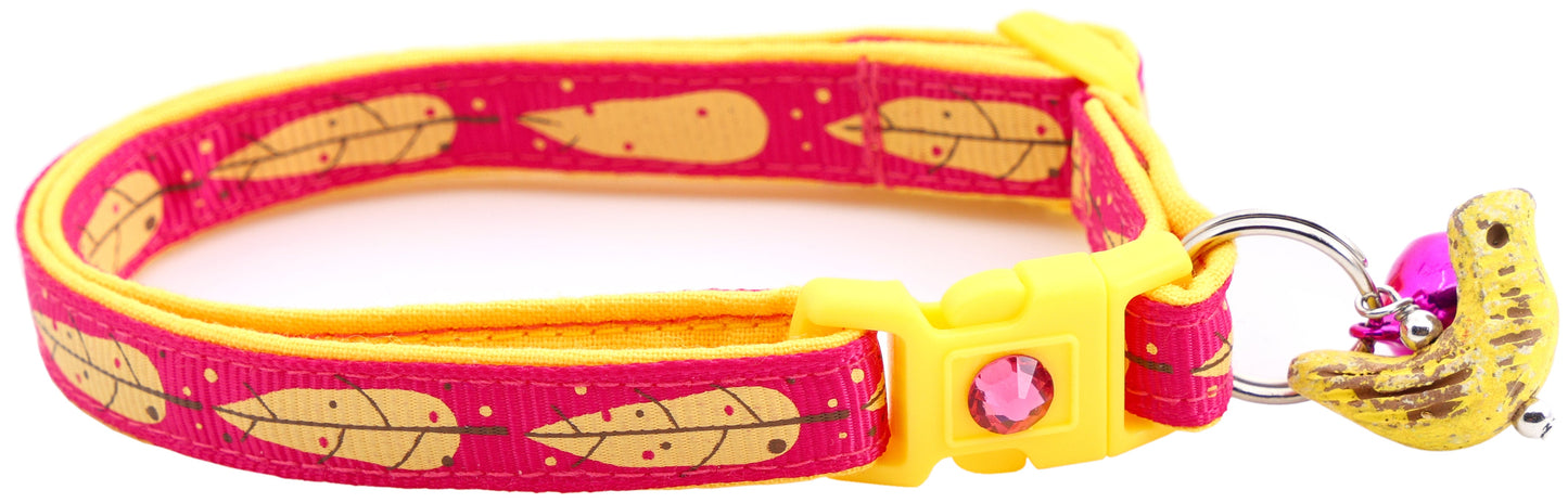 Yellow Bird Feathers on Bright Pink Cat Collar